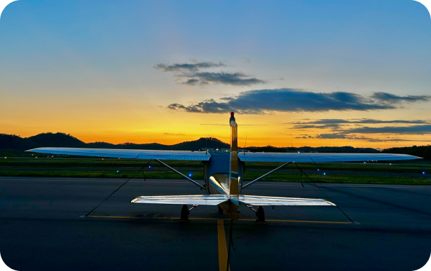 a plane on the runway at dusk at Nashville's Premier Flight School